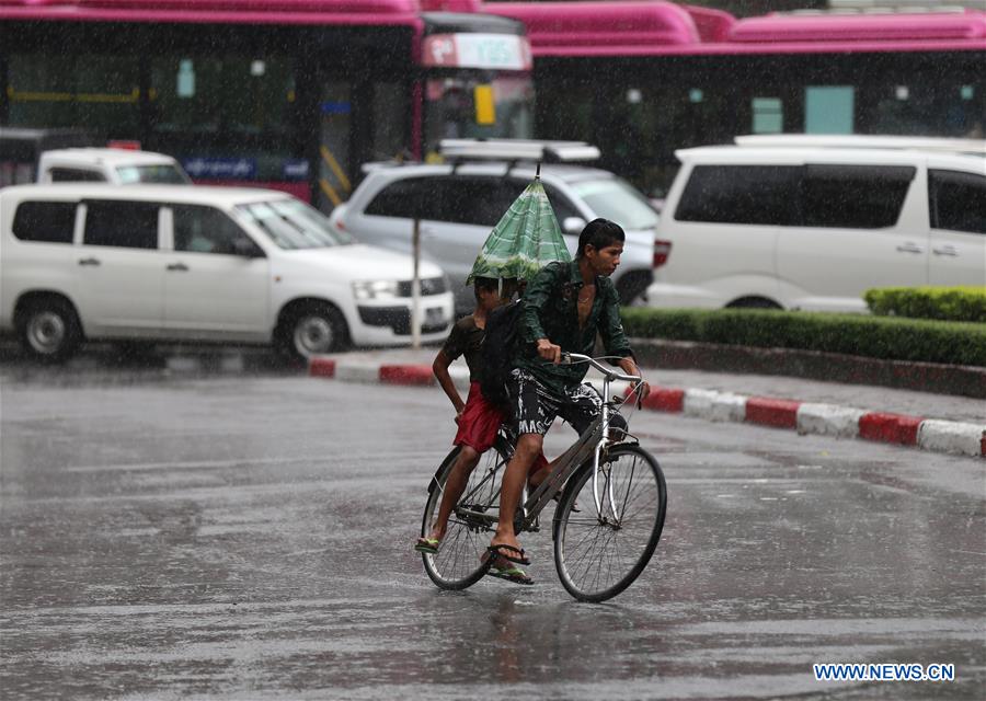 MYANMAR-YANGON-MONSOON-RAINING