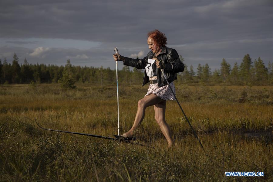 FINLAND-PUDASJARVI-SWAMP SKIING-COMPETITION